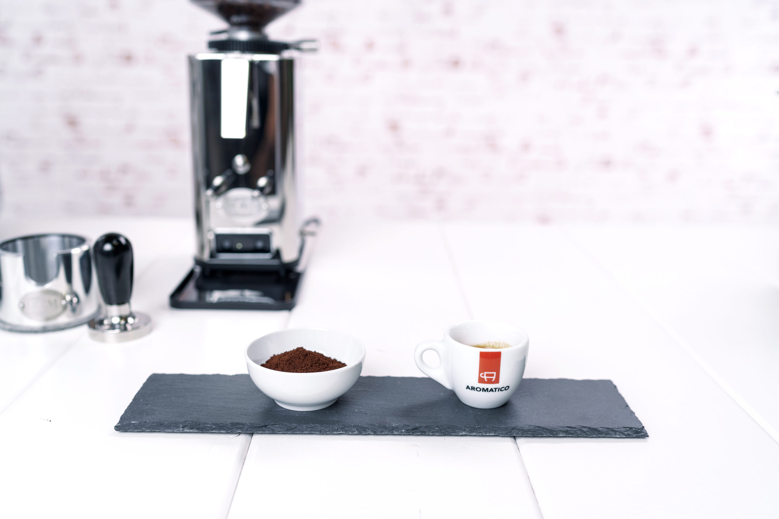 Espresso Aromatico Tasse, gemahlen, Kaffeemehl, Hintergrund ECM